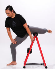 Load image into Gallery viewer, Model performing groin release exercise on anti gravity foam roller
