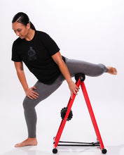 Load image into Gallery viewer, Model performing groin release exercise on anti gravity foam roller