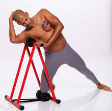 Load image into Gallery viewer, Felix Sanchez, Olympic Gold Medalist performing latissimus dorsi release on the anti gravity foam roller