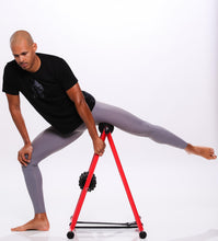 Load image into Gallery viewer, Felix Sanchez, Olympic Gold Medalist performing groin release on anti gravity foam roller
