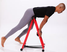 Load image into Gallery viewer, Felix Sanchez, Olympic Gold Medalist performing psaos release on the anti gravity foam roller