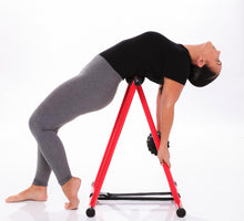 Load image into Gallery viewer, Model foam rolling the midback region on the anti gravity foam roller